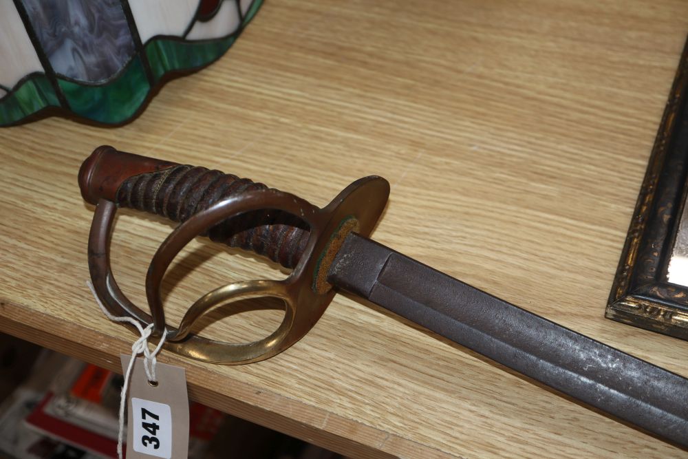 An American Cavalry sabre, stamped US 1864 AGM (lacking scabbard), indistinct possible makers mark to the opposite side of the US st